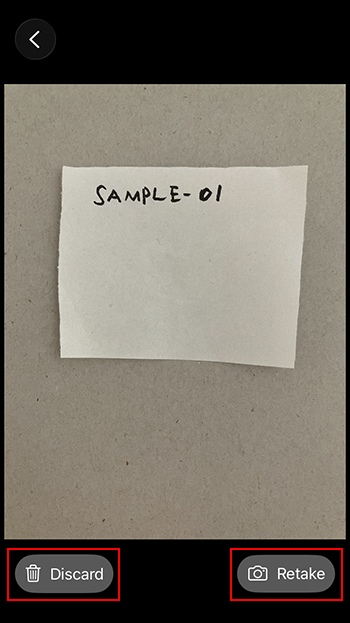 Captura de pantalla: "Retomar" y "Descartar foto" están resaltados