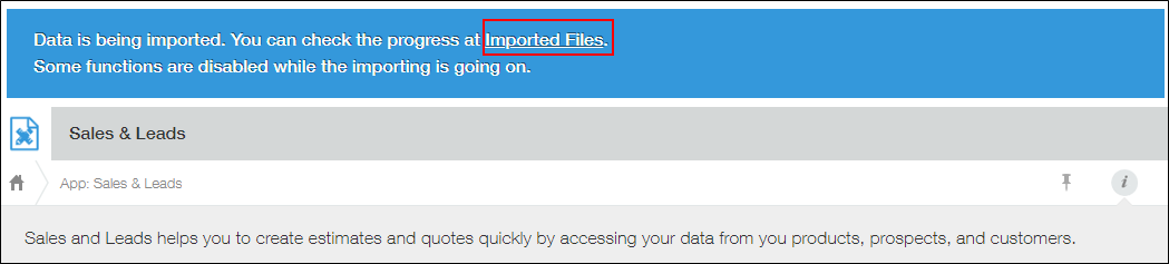 Captura de pantalla: El enlace "Archivos importados" está resaltado en el banner "Se están importando datos" que se muestra en la parte superior de la pantalla "Ver".